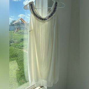 ENFOCUS Ivory mini dress with beaded neckline and ties in the back of neckline